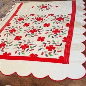 Charming Floral Quilt with Red Accents